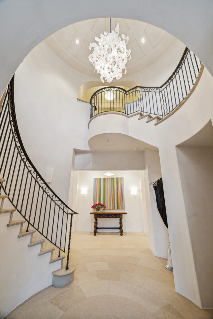 The foyer at 119 Carnarvon, wrapped in a spiral staircase, stetchess 22 feet upward. (Photo by TK Images)