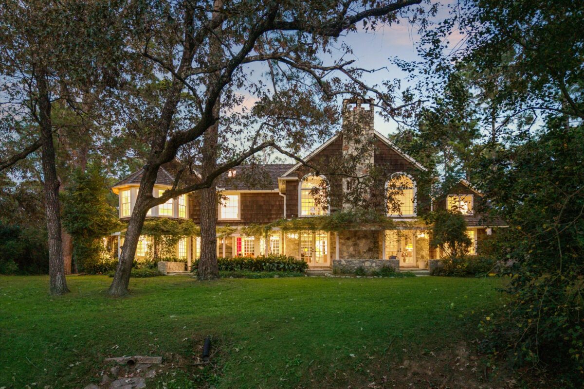 Houston’s Own Nantucket Mansion Is a .2 Million Stunner Hidden In a Forest of Pines With Its Own Lighted Clay Tennis Court
