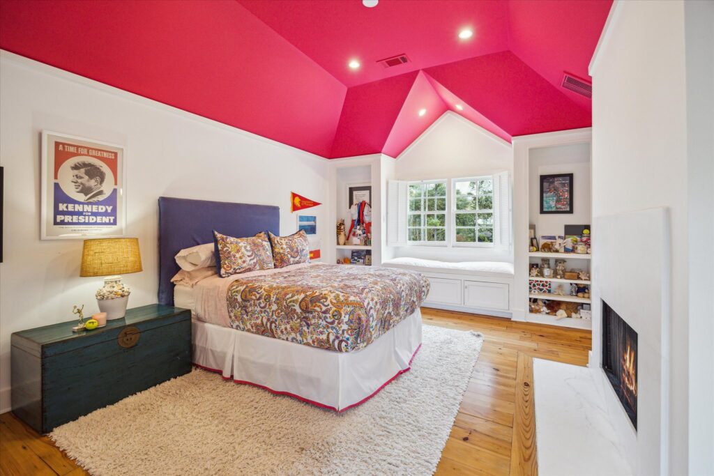 A colorful guest bedroom at 8899 Sandringham in Houston's Bayou Woods subdivision (Photo by TK Images/Compass)