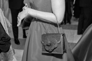 The black tie affair brought out chic clutches and glamorous handbags. (Photo by Nate Rehlander)