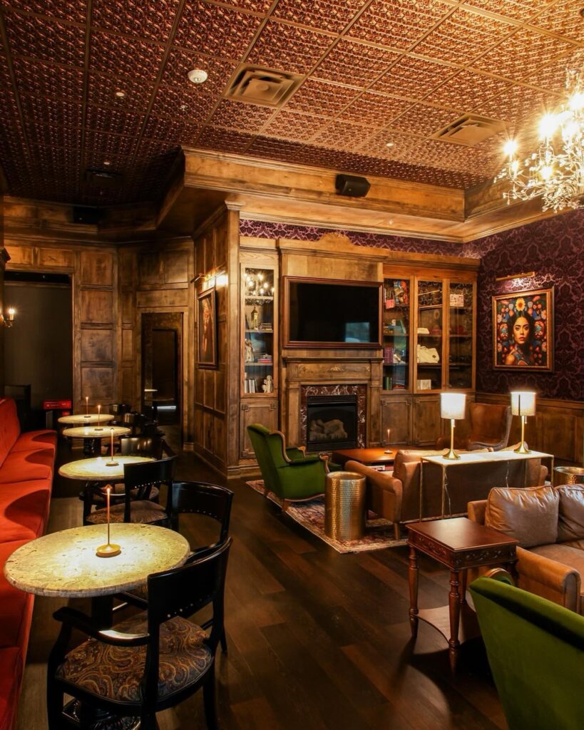 The dimly lit Atlas serves a low-key yet sophisticated happy hour. (Courtesy)