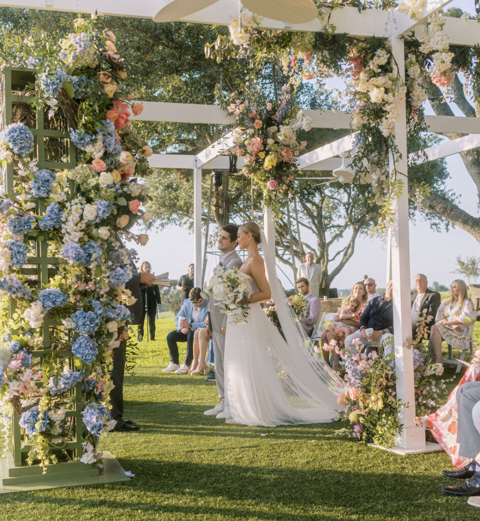 Blake Fertitta & Dana Wempe exchange vows at the F6 Fertitta  Farm (Photo by Joseph West Photography)