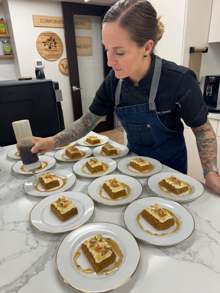 Chef Jordan Dolan of Savory Events plates at a Woodlands Super Club event last October.