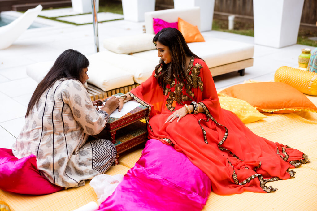 Sneha Merchant celebrates the henna ceremony for Ruchi and Walter's wedding  (Photo by Hung Truong)