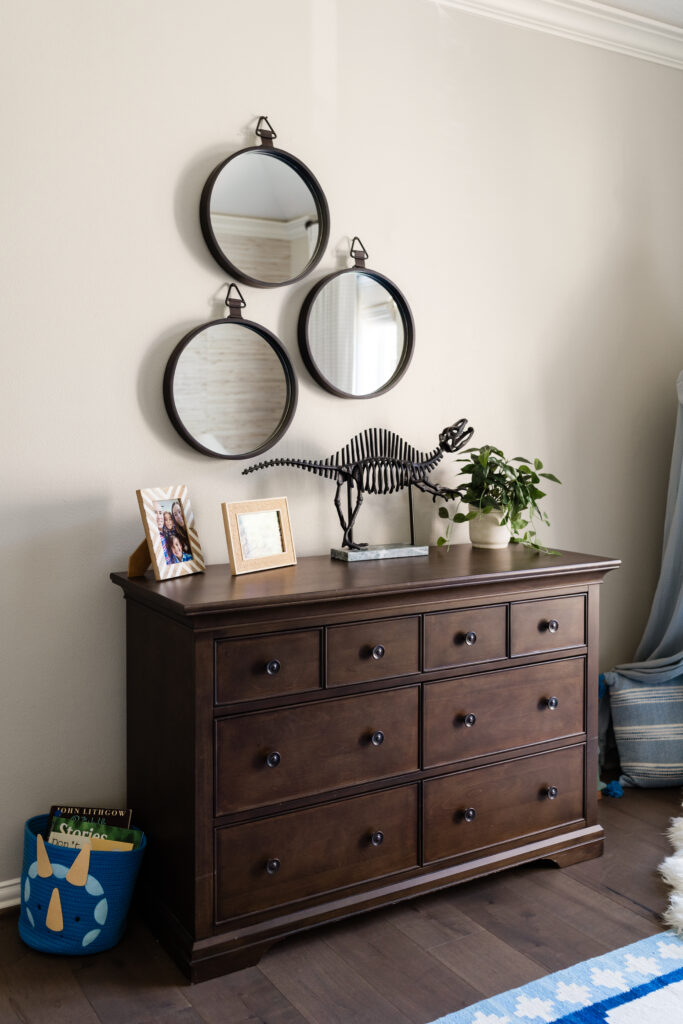 Dinosaurs are the current favorite in this boy's bedroom, created by Tiny Haven Design.