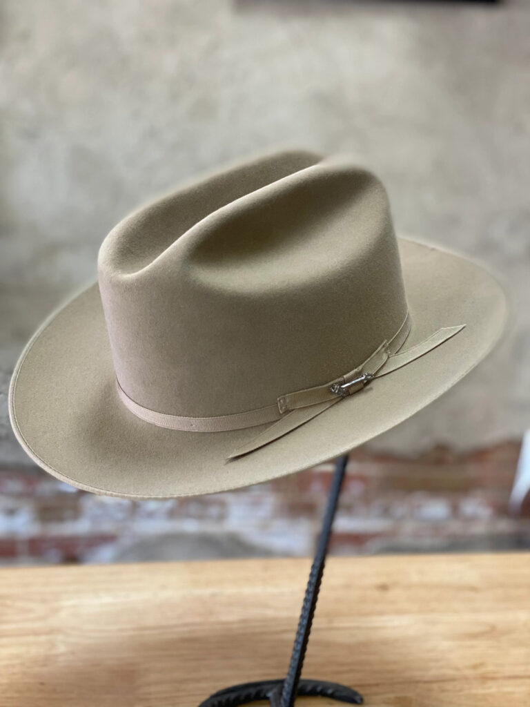 For a "timeless blend of city style and Western tradition," try Stetson's Open Road hat in "Fawn" ($320), which features grosgrain band and a Stetson hat pin. (Photo courtesy of McKinney Hat Co.)