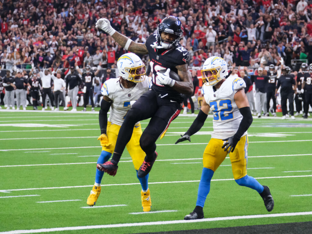 Houston Texans receiver Nico Collins doesn't let double teams stop him. (Photo by F. Carter Smith)