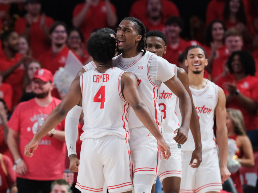 LJ Cryer is becoming a more vocal leader for Houston, pumping up teammates like center Ja'Vier Francis. (Photo by F. Carter Smith)