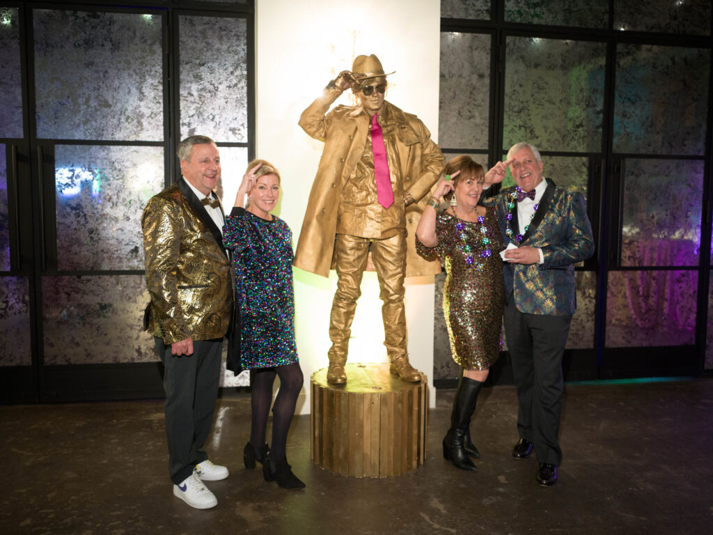 Danny &  Laura Palmer, a living statue, Heather & Paul Palmer at Camp for All's  Mardi Gras themed Krewe de Camp gala  (Photo by Daniel Ortiz)