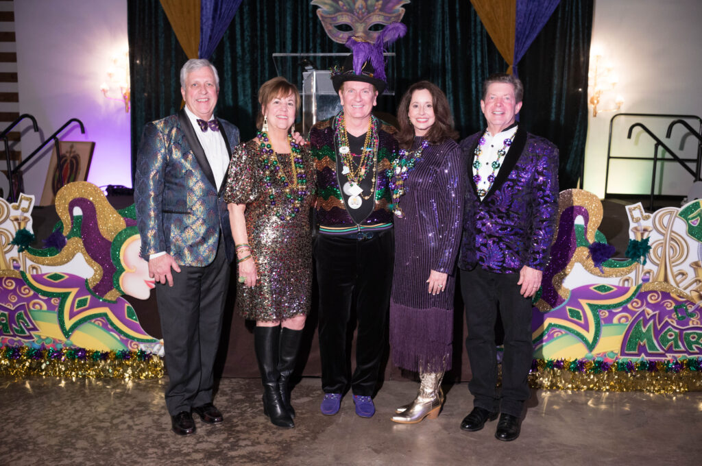 Chairs Paul & Heather Palmer with Frank Billingsley, chairs Rickie & Stacy Duke at Camp for All's Krewe de Camp gala.  (Photo by Daniel Ortiz)