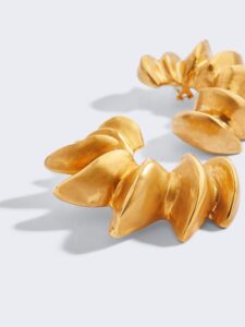 The flagship Downtown Dallas Neiman Marcus is one of three locations in the country that sells Schiaparelli, the surrealist house that Daniel Roseberry built. You are both shopping local AND supporting homegrown talent (Roseberry is from Plano), then, by requesting a pair of Schiaparelli earrings for Valentine’s Day, like these Croissant Earrings ($2,200). (Photo courtesy of Schiaparelli)