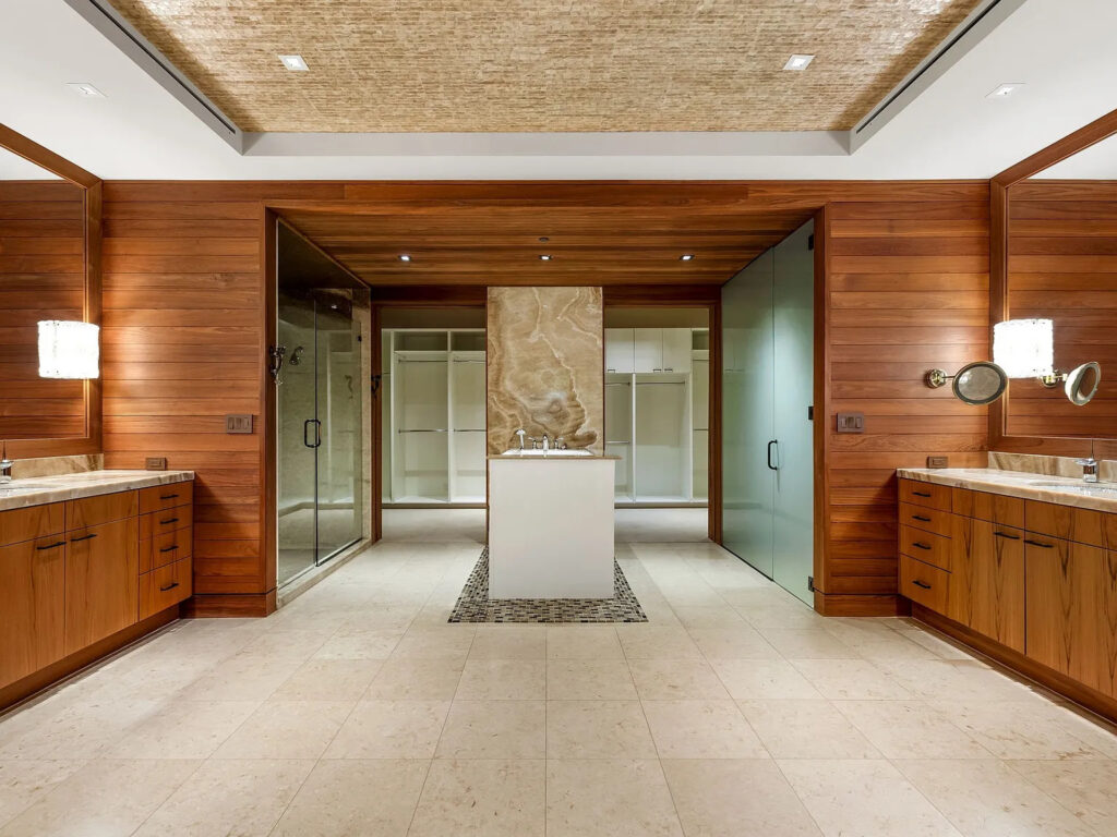 Soak the day away in the magnificent primary bathroom's central soaking tub. (Photo courtesy of Allie Beth Allman & Associates)