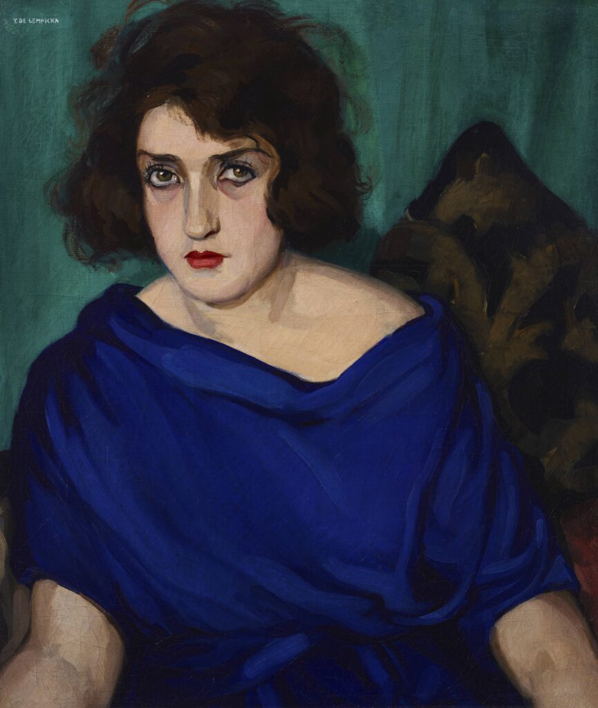 Tamara De Lempicka's "Portrait of a Young Woman in a Blue Dress," 1922, at the Museum of Fine Arts, Houston (Private collection © Tamara de Lempicka Estate, LLC / ARS, NY / ADAGP, Paris. Image © 2023 Christie's Images Limited)