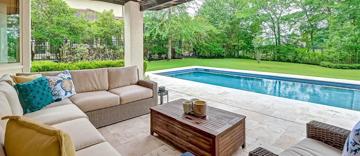 Retreat to a resort-worthy backyard at 14 N Player Manor.