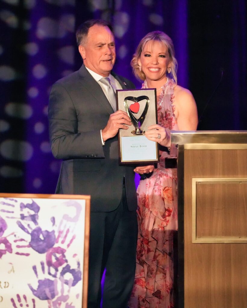 Rep. Steve Toth was the 2025 Heart of Gold Recipient at the Love Heals Youth gala as presented by LHY Founder Rebecca Smith. (Photo courtesy of Love Heals Youth)