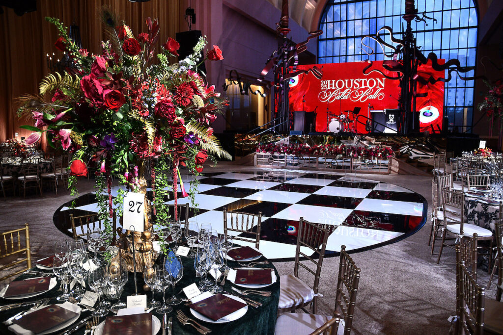The 2025 Houston Ballet Ball table setting and checkerboard dance floor  at the Wortham Theater Center. (Photo by Dave Rossman) 