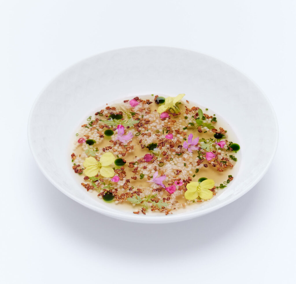 Starters at Cafe Dior include Miss Dior Consomme, inspired by the iconic dress. (Photo by Harry Eelman)