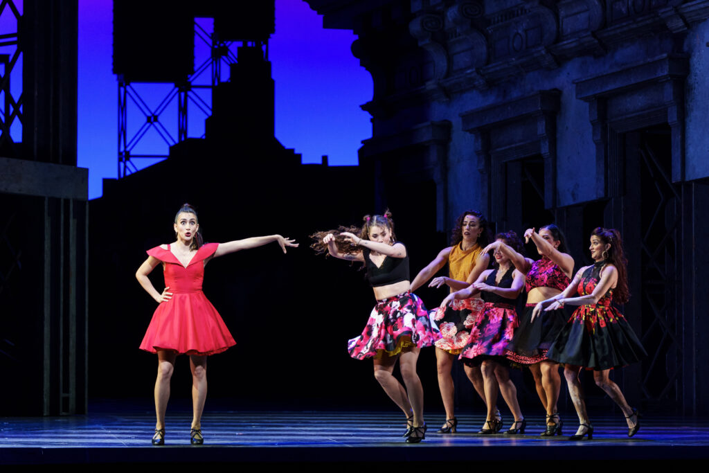 Yesenia Ayala as Anita and cast members at the final dress rehearsal of West Side Story presented by the Houston Grand Opera. (Photo by Michael Bishop)