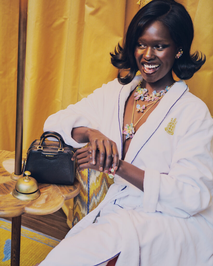 Givenchy Antigona cube bag $2,050, at the Givenchy boutique, Neiman Marcus. Swarovski Dulcis cuff $650, Idylia necklace $650, butterfly pendant $400, flower pendant $600, and ear-cuff set $330, at the Swarovski boutique, Neiman Marcus. (Photo by Khristio)