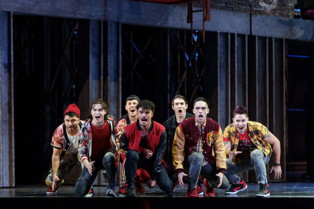 Yurel Echezarreta as Bernardo and cast members dancing at the final dress rehearsal presented by the Houston Grand Opera. (Photo by Michael Bishop)