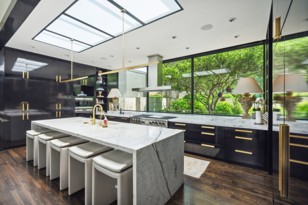 Black cabinets create a chic look in the new kitchen at 6224 Indian Creek Drive. (Courtesy)
