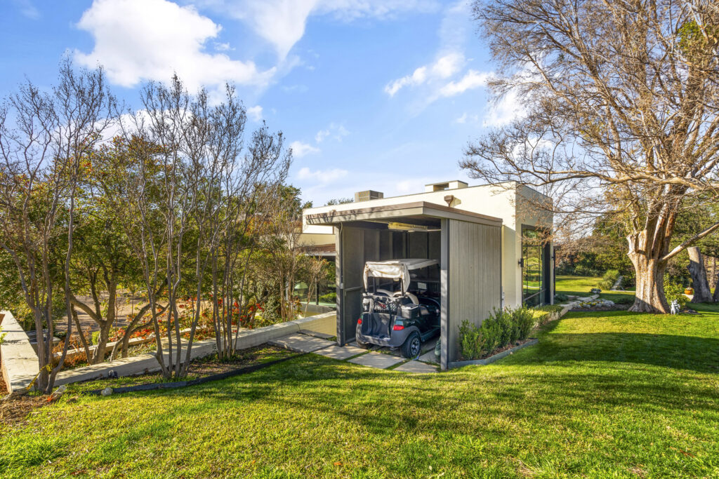 A golf cart garage makes it easy to get from home to the green. (Courtesy)
