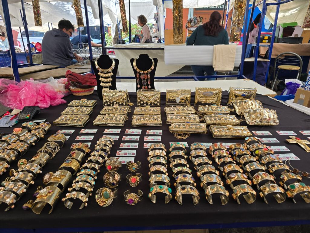 The booth at San Ángel Market, featuring a stunning collection of handcrafted purses, bangles, and other unique pieces, each reflecting the dedication and artistry of a family tradition. (Photo courtesy Gabriela Torres Zaragoza)