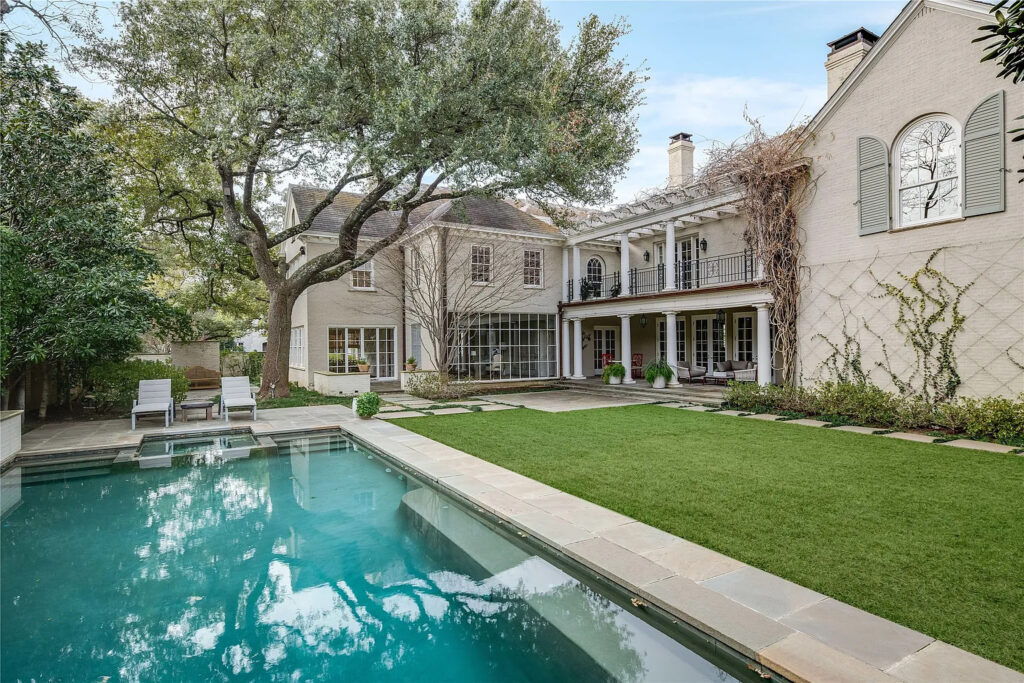 The backyard oasis at 4226 Arcady Avenue includes a glimmering pool. (Photo by Allie Beth Allman & Associates)
