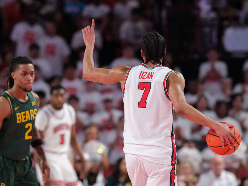 University of Houston's new starting point guard Milos Uzan is embracing its multiple option offense and eliminating turnovers from his game. (Photo by F. Carter Smith)
