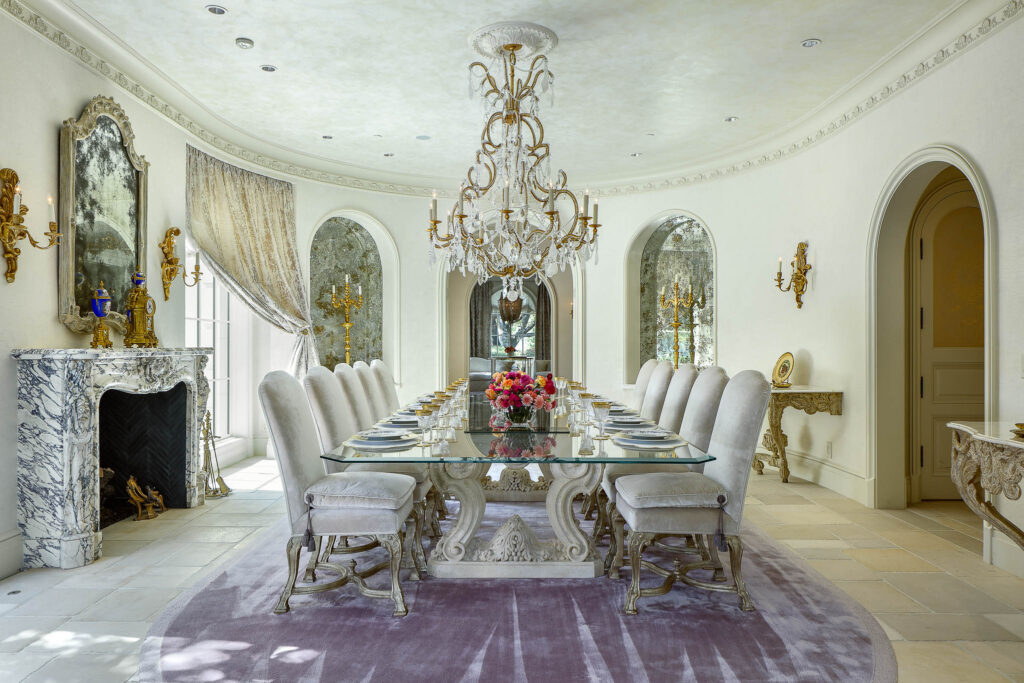 The designer imported limestone flooring from a French chateau, exterior limestone trim from Italy, travertine from Mexico and handmade roof tiles from Colombia. (Photo by Briggs Freeman Sotheby's International Realty)