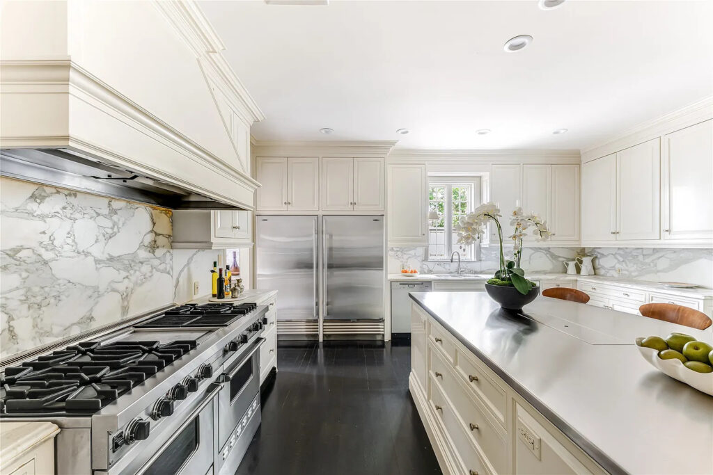It offers all the bells and whistles, from two Miele dishwashers to Sub-Zero appliances.  (Photo by Allie Beth Allman & Associates)