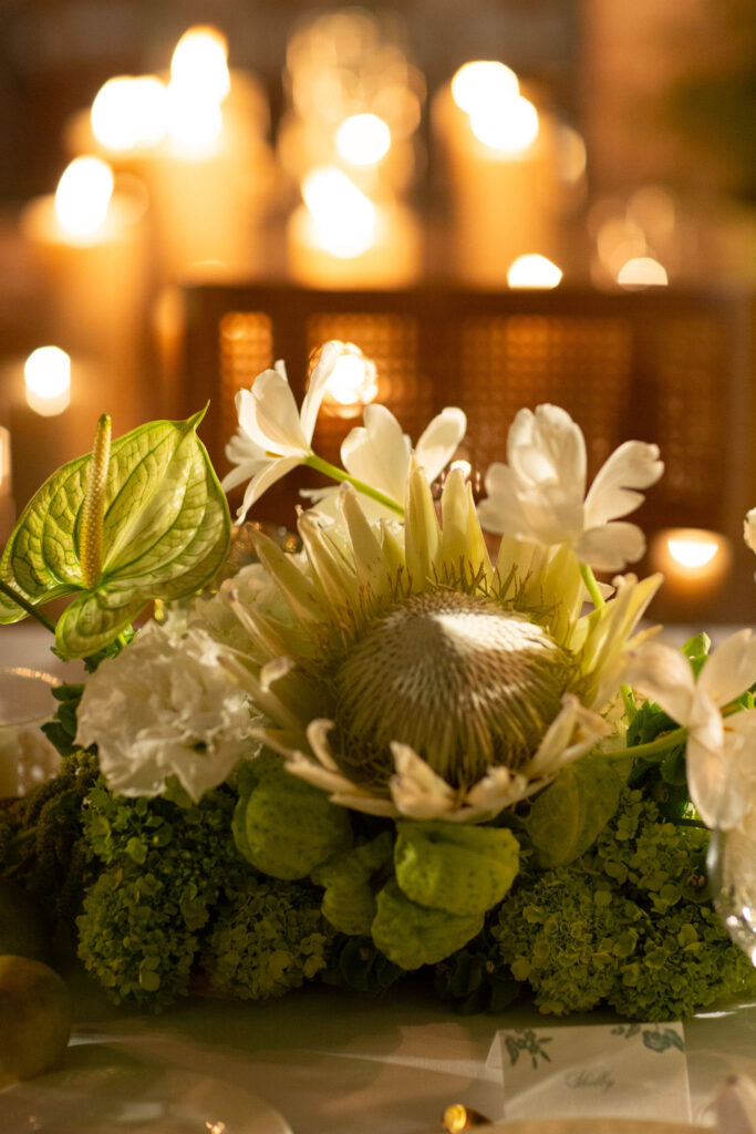 Richard Flowers and The Events Company dressed the rehearsal dinner table with exotics. (Photo by Kara Martinez)