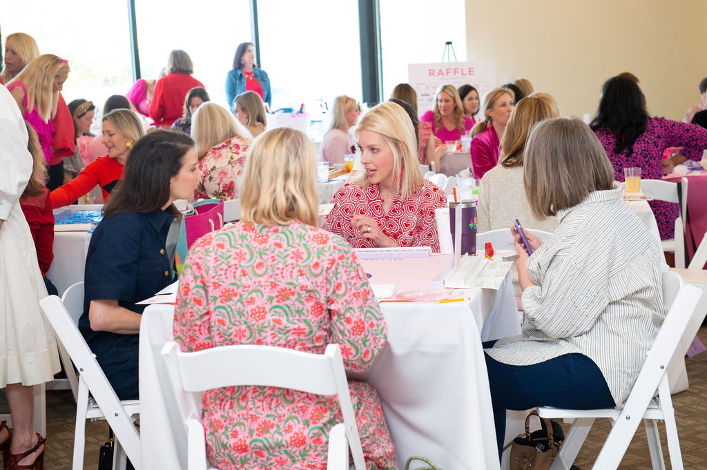 Guests jubilantly donned their most festive 'fits in every combination of red, pink, and purple imaginable. (Photo by Tamytha Cameron)