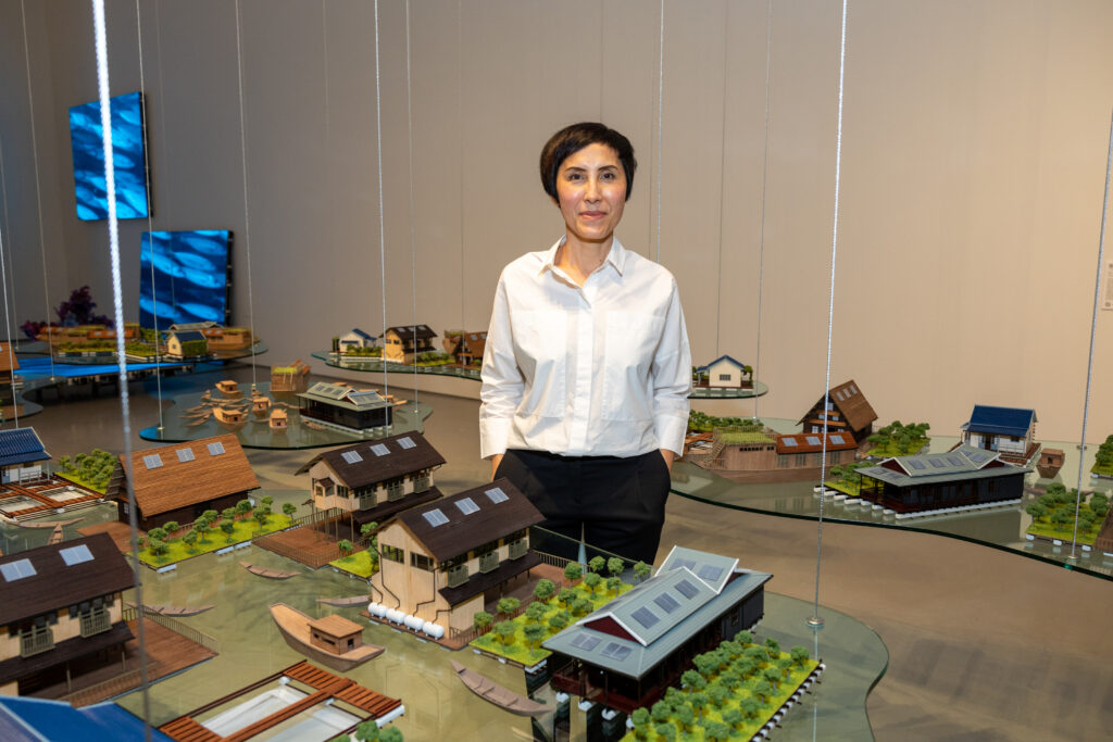 Honoree Tiffany Chung shows off her work at A Dinner for the Moody at Rice University’s Moody Center for the Arts. (Photo by Jenny Antill Clifton)
