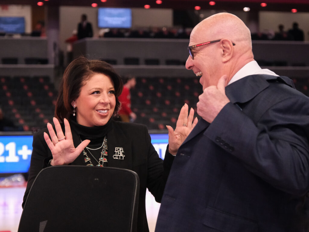 University of Houston director of basketball operations Lauren Sampson and ESPN's Seth Greenberg share a moment. (Photo by F. Carter Smith)