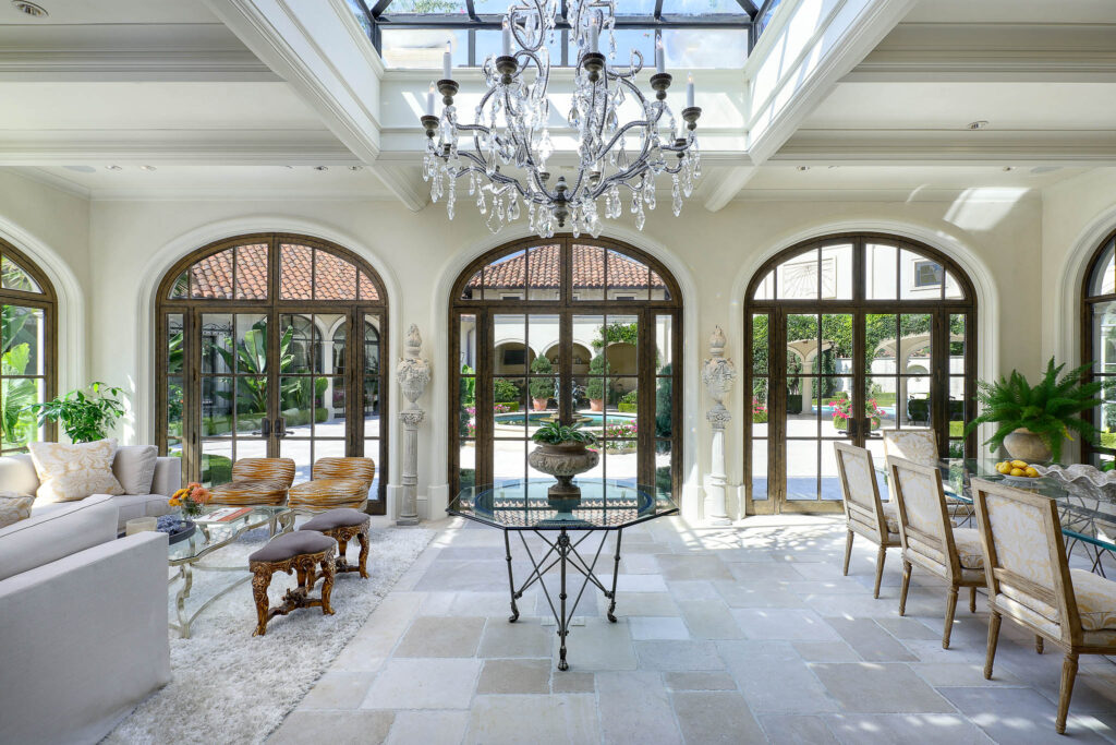 Large windows offer a peek into the tranquil grounds. (Photo by Briggs Freeman Sotheby's International Realty)
