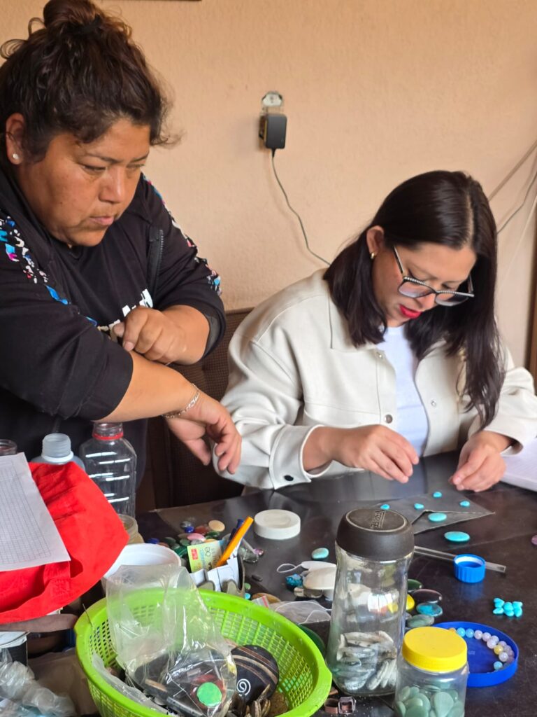 Leticia Chaparro and Gabriela Torres Zaragoza carefully select turquoise stones. Every detail matters in the creation of these one-of-a-kind handcrafted pieces. (Photo courtesy Gabriela Torres Zaragoza)