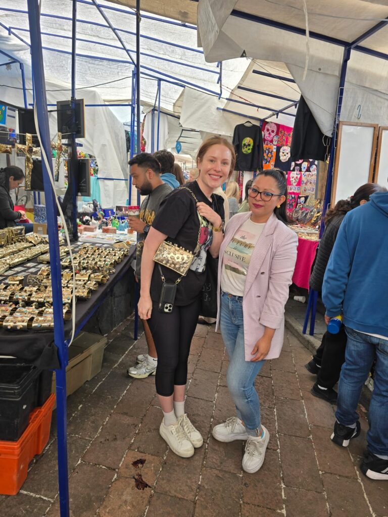 Another satisfied customer poses with Gabriela Torres Zaragoza, celebrating the unique craftsmanship and timeless designs that have become a favorite among customers worldwide. (Photo courtesy Gabriela Torres Zaragoza)