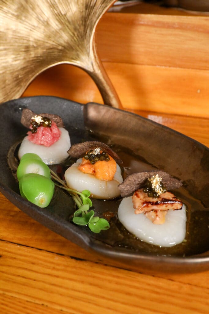 A favorite on the DOZO menu is the hokkaido scallop trio. (Photo by Yisha Zhao)