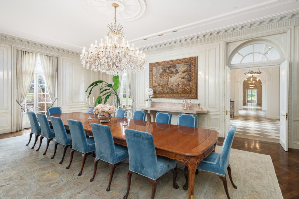 The dining room showcases the scale of the palatial mansion.  (Photo by Briggs Freeman Sotheby's International Realty)