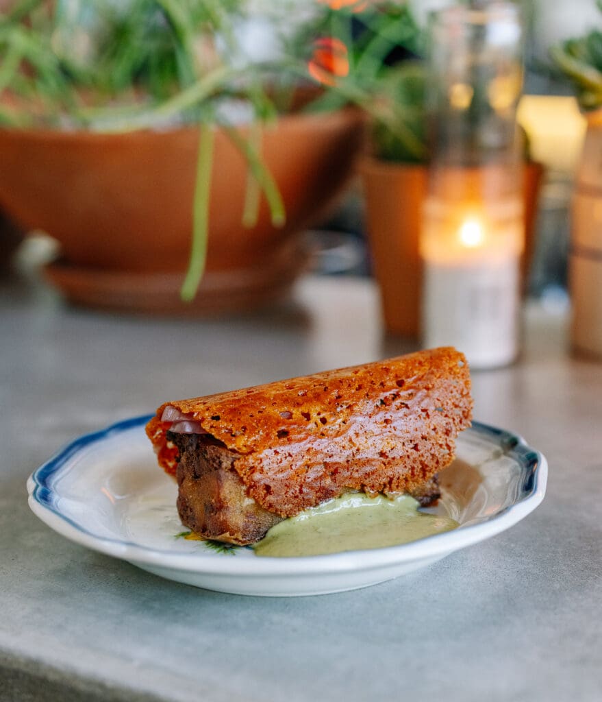 The loaded potato costra is a pleasant surprise, as it comes out griddled with cheese. (Photo by Paul Torres Garcia at Sobremesa Studios)