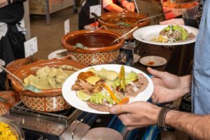 Cazuelas of Mole, Short Rib Pipian Rojo, Chicken Pipian Verde, and Chiles Rellenos en Nogada.