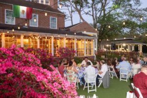 Colorful azaleas adorned the back lawn of the Manor House at the Tribute to Mezcal event.