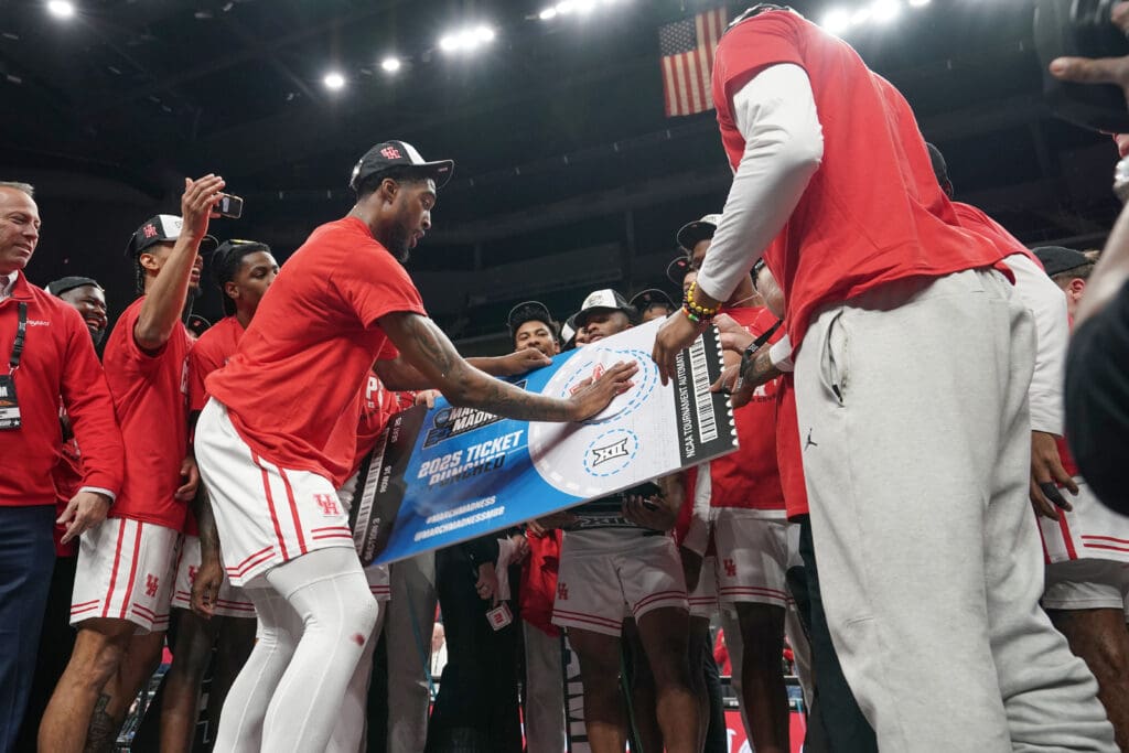 Ja'Vier Francis rightly got to slap Houston down as the Big 12 Tournament champions too.
(Photo by Denny Medley/Big 12 Conference)