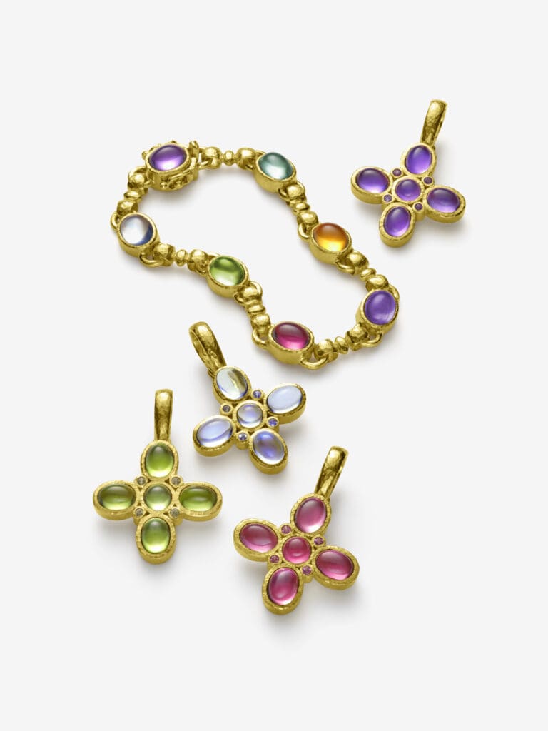 Her expansive collection features pendants, earrings, and charms.