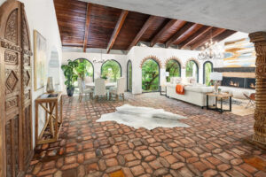 The Italian influence is readily apparent in the way that home blurs indoor and outdoor living. (Photo by Briggs Freeman Sotheby's International Realty)