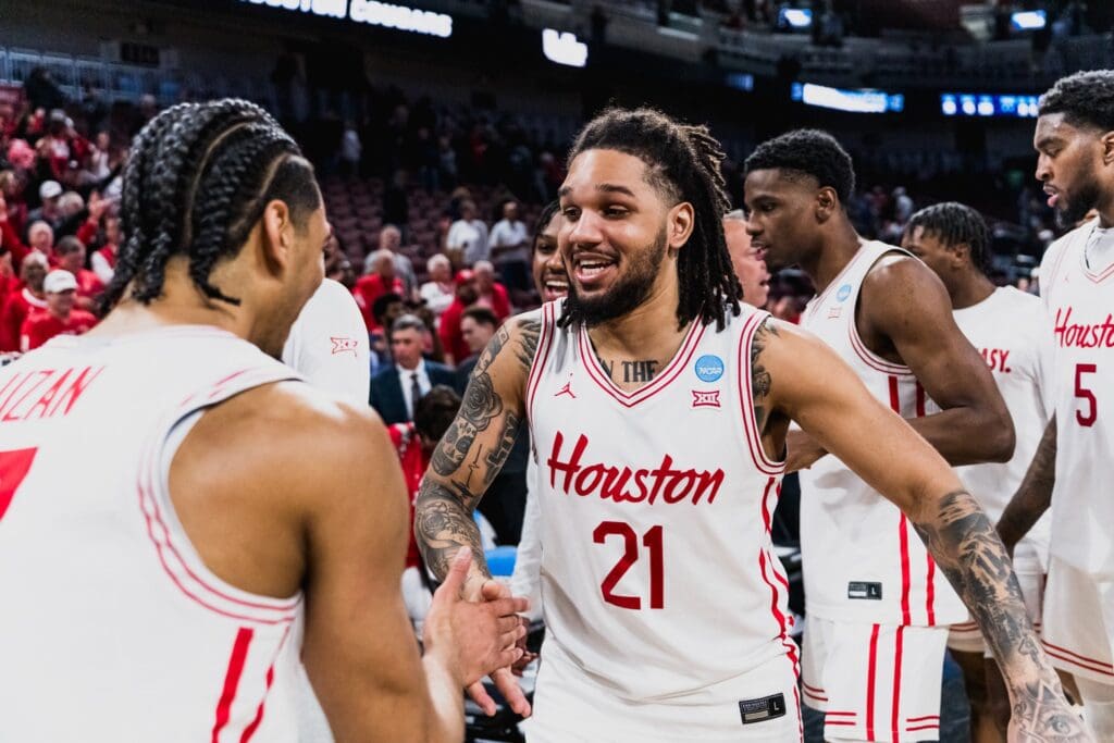 MIlos Uzan and Emanuel Sharp share a moment after holding off Gonzaga. @UHCougarMBK) 