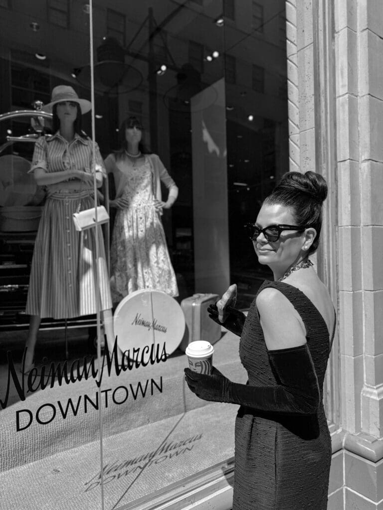 I cosplayed as Holly Golightly in a tweed boatneck LBD from Erdem with low Christian Dior black patent leather pumps. I traded the pearls for a Schiaparelli gold padlock necklace featuring an etching of Place Vendôme that I purchased at the store's shop-in-shop. (Photo by Sarah Day Ring)