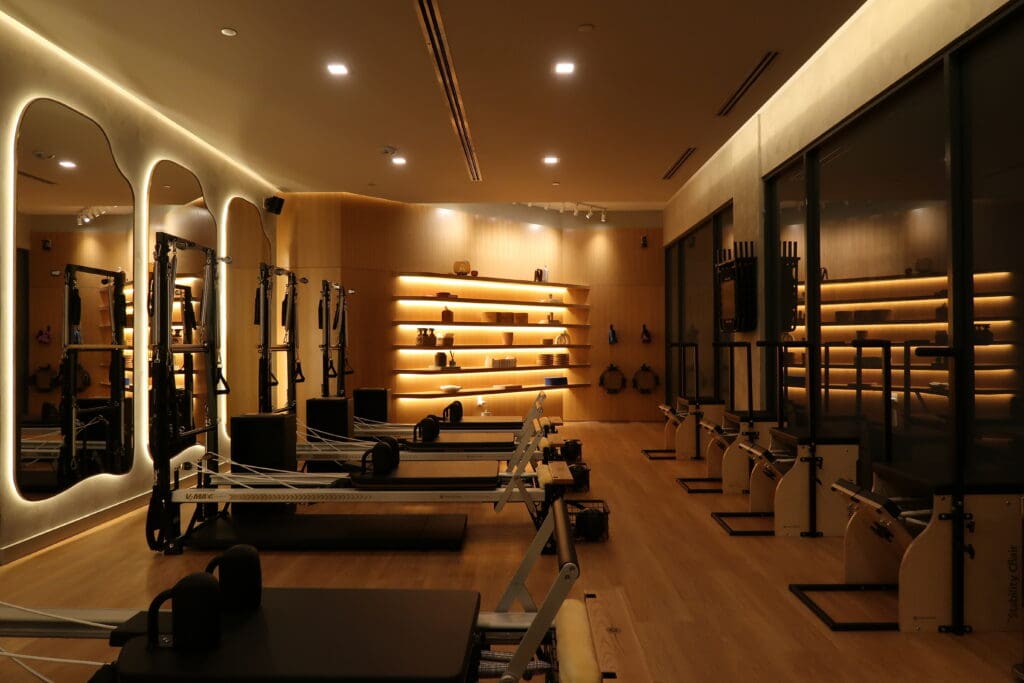 The thoughtfully designed 3,400-square-foot space offers group and private reformer sessions, as well as heated mat Pilates. (Photo by Forma Pilates)