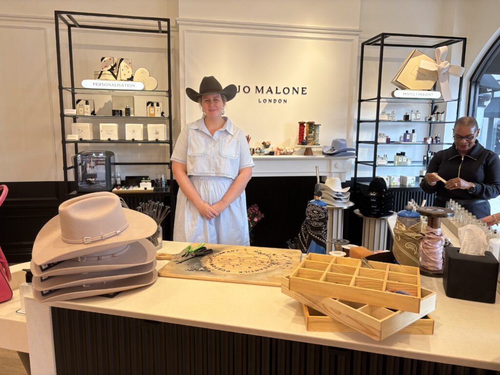 Katie Monsen brought her bespoke hat collection to The Woodlands' Jo Malone, with lots of options for embellishment and personalization. (Photo by Laura Landsbaum)